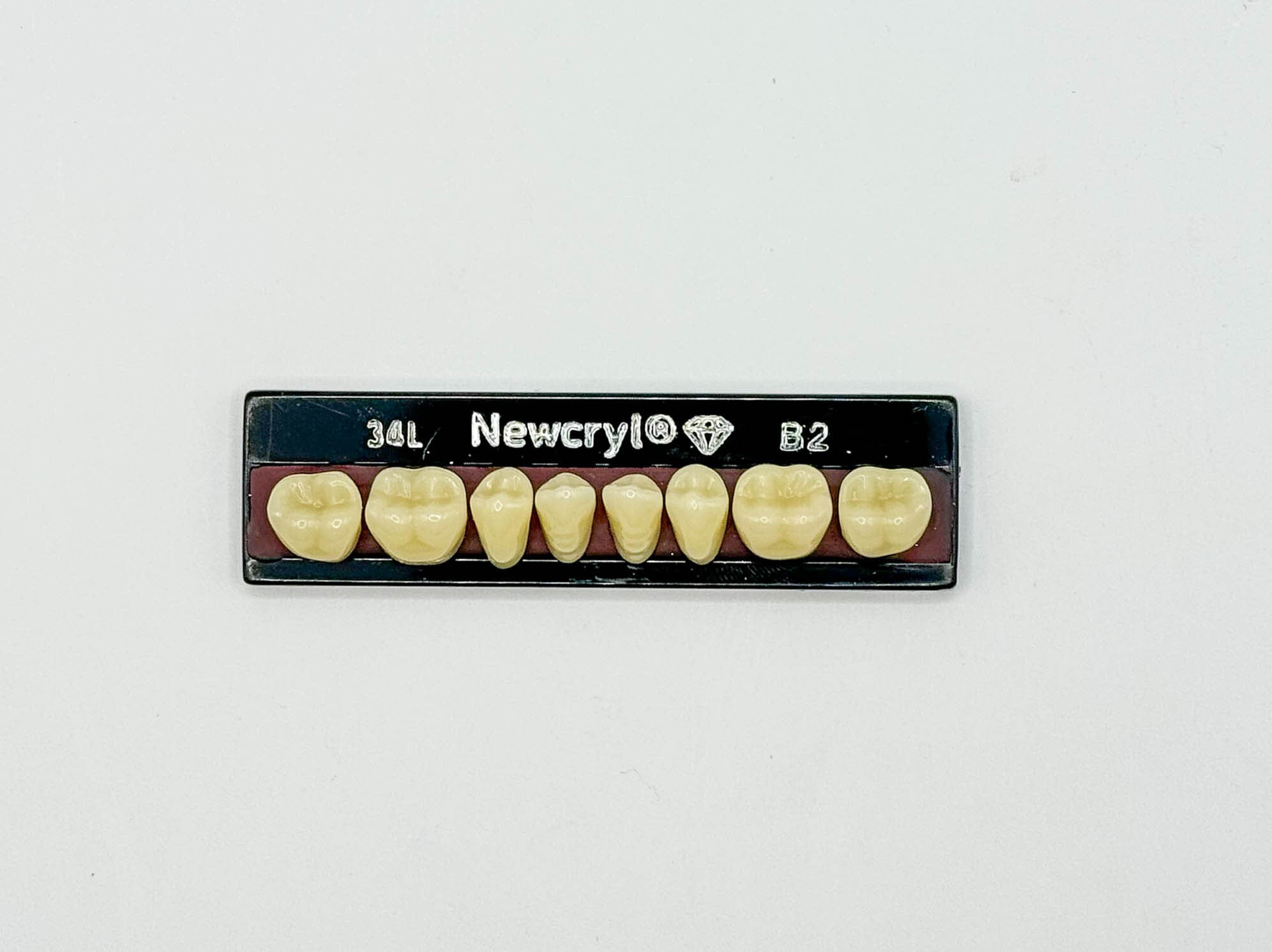 Dientes newcryl x 8 ip 34l col b2