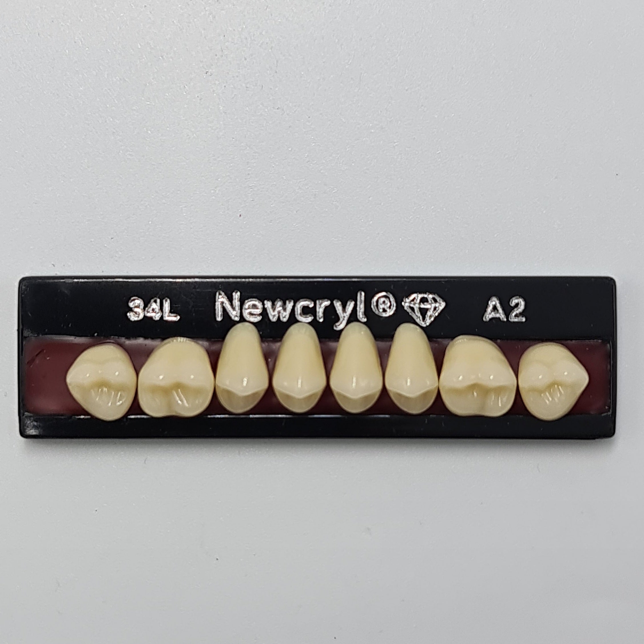 Dientes newcryl x 8 sp 34l col a2