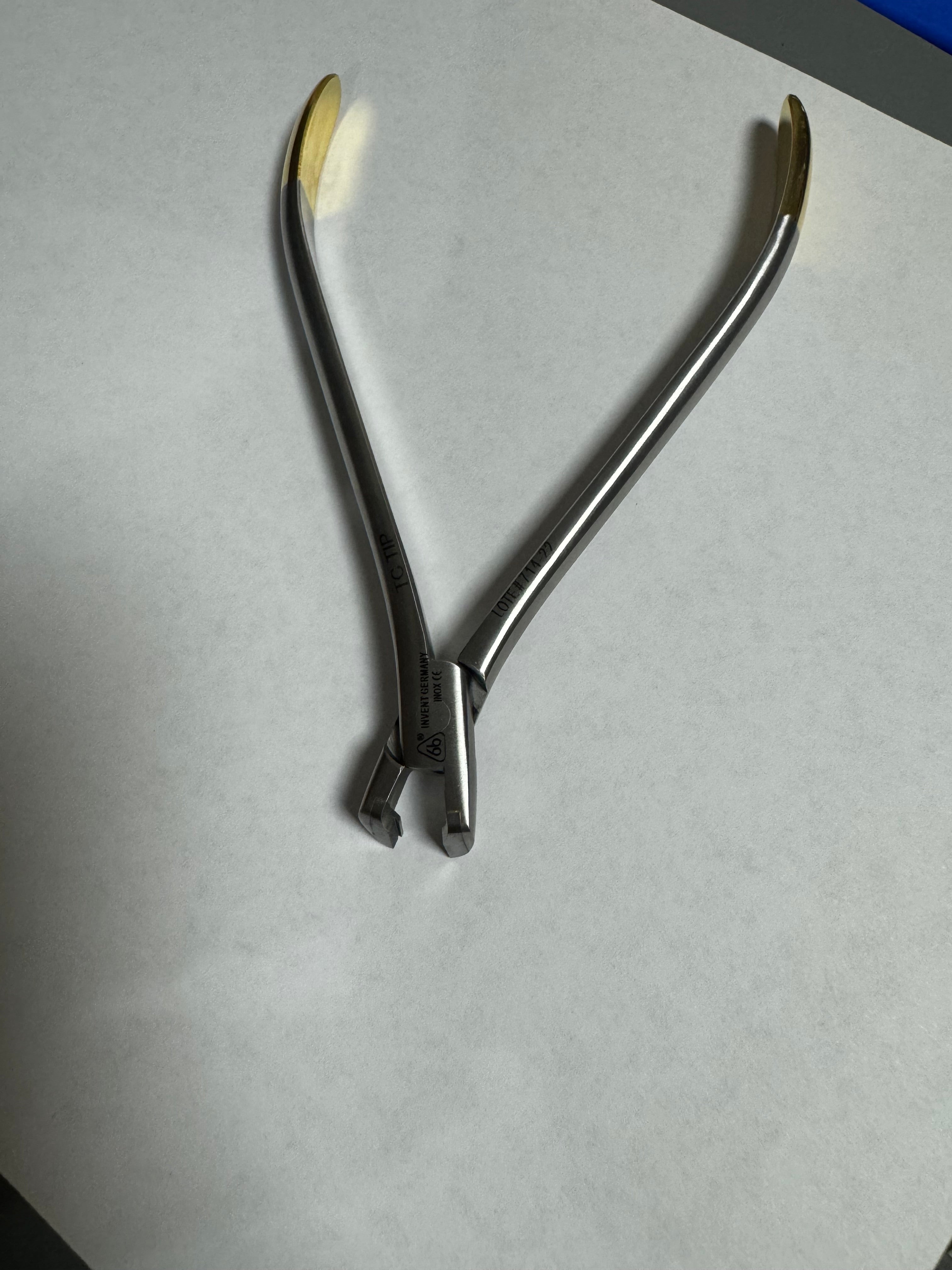 Pinza distal c/ret punta fina 14.5cm