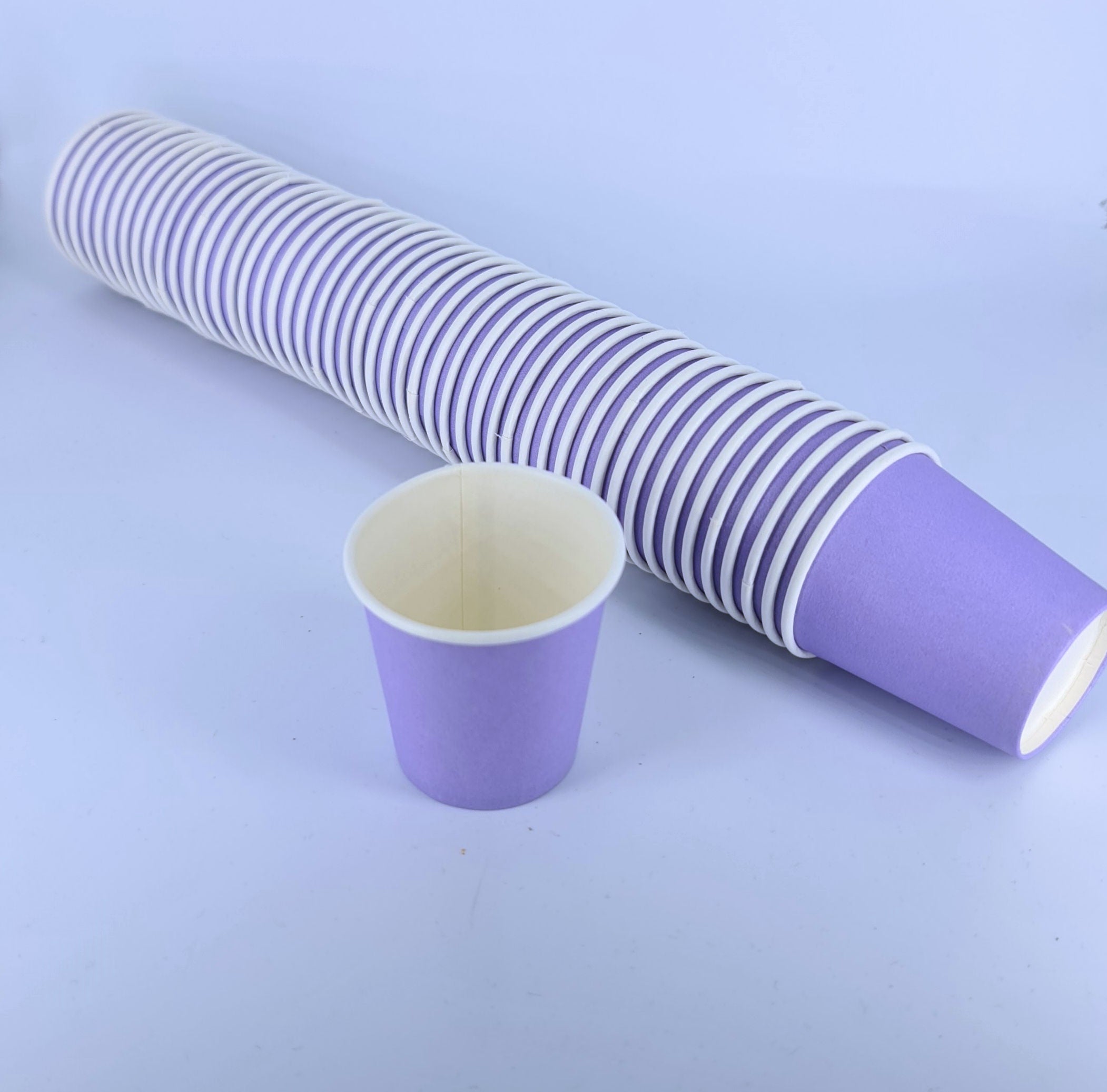 Vaso Dental Purpura 2oz Uniseal (50 pzas)